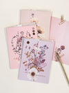 greeting cards with pen on table