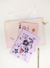 greeting cards with pen on table