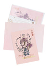bundle blooms birthday card on table