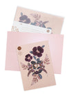 plum leaves greeting card on table